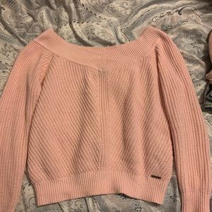 Pink off-the-shoulder sweater